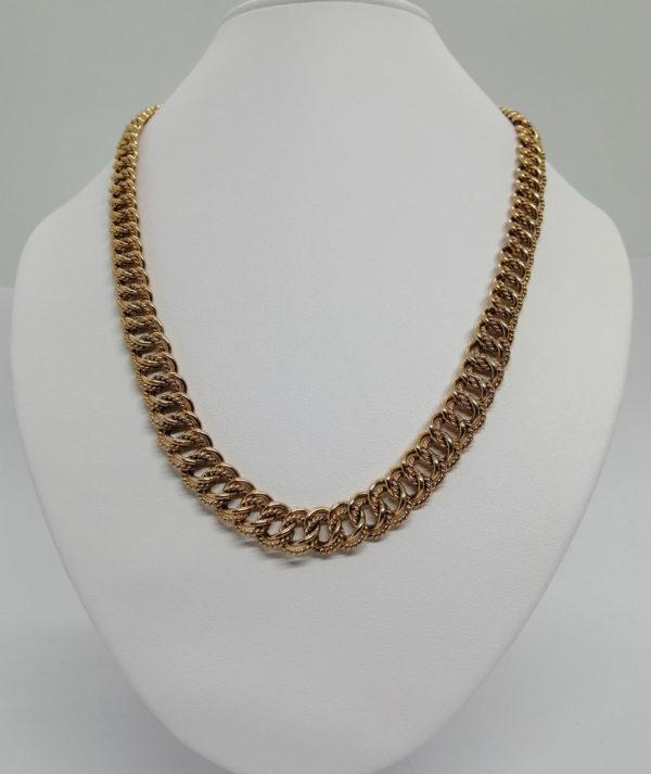 Collier maille gourmette travaillée, plaqué or, de marque Mûrat.