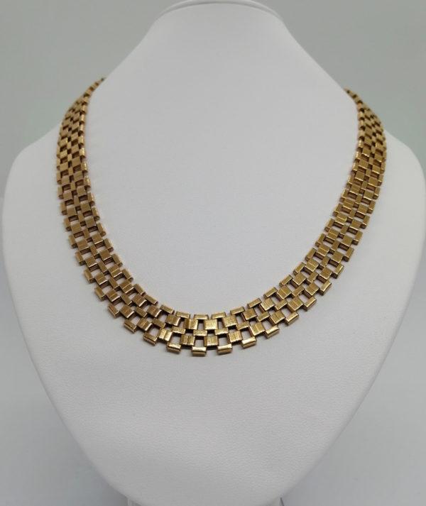 Collier maille plate articulée, en plaqué or, 1930-40.