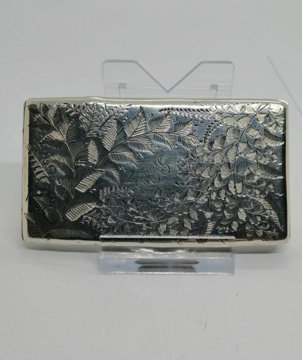 Etui pince-billets en argent, opulent décor floral et feuillagé, Anglais 1892.