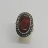 Bague argent, gros cabochon de cornaline et entourage de marcasites, 1925.