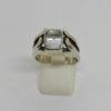 Bague argent, sertie clos d'une pierre blanche et monture originale.