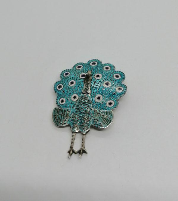 Broche argent, paon articulé, et émaillé.