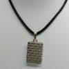 Pendentif argent, façon livre, porte-photo, 1930-40.