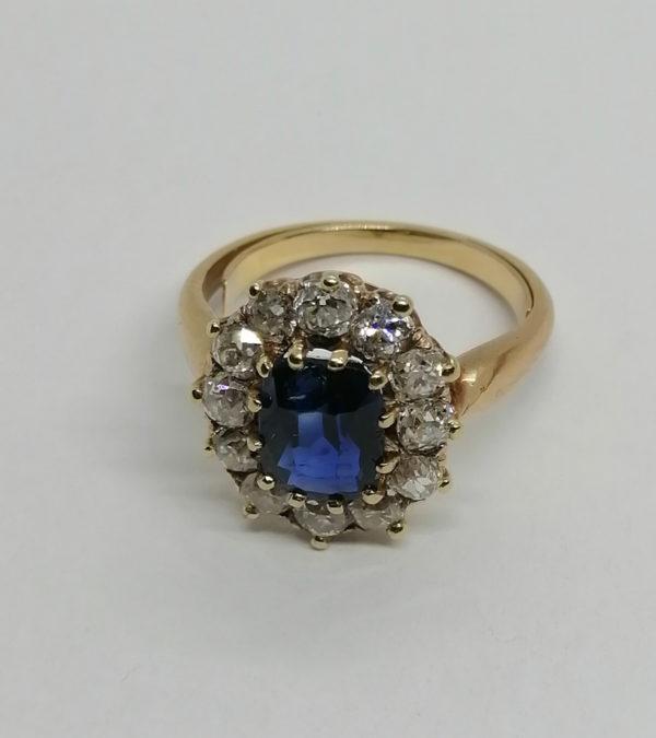 Bague en or jaune, marguerite avec saphir et diamants taille ancienne, vers 1925-30. – Image 2