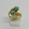 Bague en or jaune, façon cornes d'abondances et sertie de turquoises, vers 1930-40.