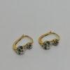 Paire de boucles d'oreilles or jaune et gris, sertie de diamants taille ancienne et roses, vers 1920.