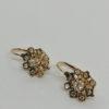 Boucles d'oreilles en or rosé et pavage de diamants, vers 1900.