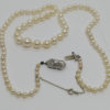 Collier fermoir or gris et diamants, chute de 93 perles de culture, 1930. – Image 4