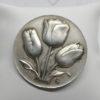 Broche en bronze argenté, décor de tulipes, Art Déco, vers 1930.