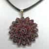 Pendentif en pomponne, et pavage de grenats taille bohême, vers 1890-1900. – Image 2