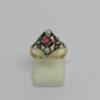 Bague argent/vermeil, pierre rouge et demi-perles d'imitation, vers 1900.