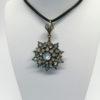 Pendentif argent vermeil, verre taillé et facetté, fin 19ième siècle.