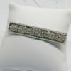 Broche/barette, en vague, avec pavage de strass blanc, 1930.