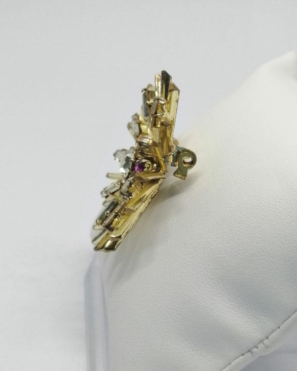 Broche, en forme de soleil, avec sertie de strass baguettes, vers 1930-40. – Image 3