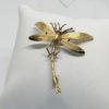 Broche, plaqué or, libellule, vers 1930-40.