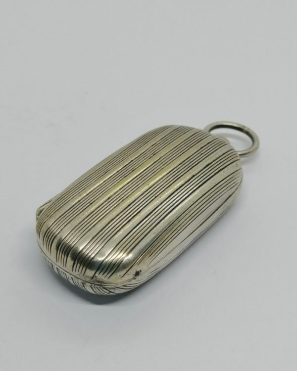 Porte-pièce de monnaies, en métal argenté et léger vermeil intérieur, vers 1930.