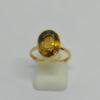 Bague en or jaune, corbeille ajourée et citrine ambrée, vers 1950-60.