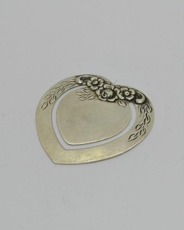 Pince-billets, argent, décor de fleurs, vers 1920.